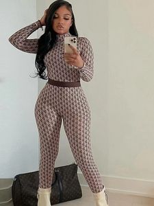 Designer Sexy moon print round neck long-sleeved one-piece skin clothing for women 23 autumn and winter ice silk Sporty Body-shaping Personality Women's Jumpsuit