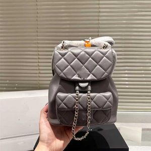 Flep mini koyun derisi 10a kadınlar klasik üst sırt çantası lüks desen dikiş moda çantası tasarımı küçük ve pratik süper çok yönlü el crossbody