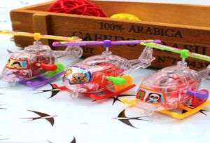 Ny rolig mini Winding Transparent Small Aircraft Spring Toys Classics Outdoor Clockwork Aircraft Wind Up Toys Gift6745679