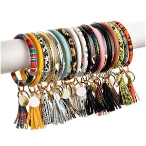 TASSLES ALBELETS KVINNER PU LÄDER WRAP KEY RING LEOPARD KEYCHAIN ​​Handband Candy Color Sunflower Drip Oil Armband Kedjor Drop Deliv DHRWV