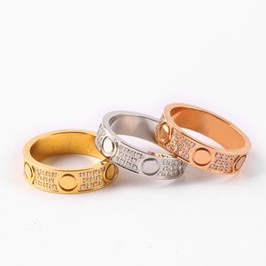 Klassiska bandringar Love Ring Titanium Steel Herrkvinnor med Diamond Letter Gold Rings Designer Luxury Girl Friend Wedding Jewelry