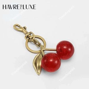 Keychains Lanyards bag accessories bag charm Handbag pendant keychain women's exquisite Internet-famous crystal Cherry car accessories high-grade 231205