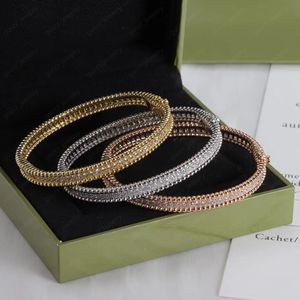 Bracciale a cerchio in oro regalo 2024 gioielli di tendenza per uomo e donna con la stessa coppia di braccialetti firmati per donna