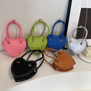 Le ragazze alla moda amano le borse a cuore INS per bambini colorate borse a tracolla stile donna borsa a tracolla in pelle per bambini S1028