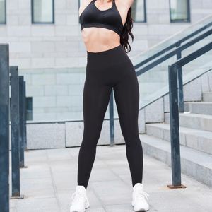 Pantaloni attivi Leggings da yoga Collant sportivi da palestra a vita alta per donna