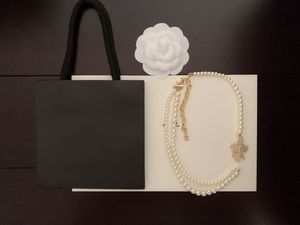 Collier de perles couronne de perles Double couche, collier de styliste pour femmes, Design de boucle élégant pour dames