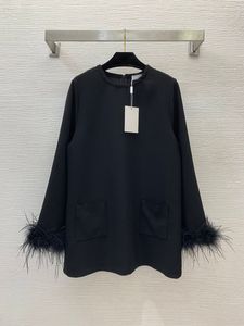 2024 Spring Black Solid Color Panelled Feather Dress Long Sleeve Round Neck Double Pockets Short Casual Dresses B4J151487