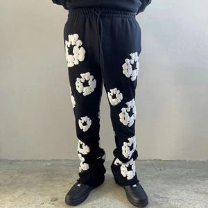 Męskie spodnie streetwear trójwymiarowy piankowy druk Flare Mężczyźni Sweat Spanty Harajuku szerokie joggery Y2K Kobiet Black Flear