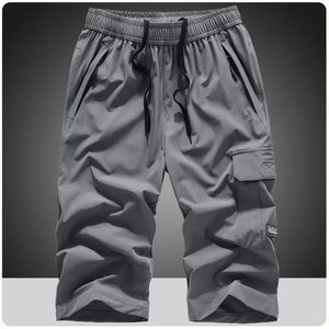 Verão masculino secagem rápida 3/4 calças leves shorts caminhadas pesca viagem casual carga shorts calças masculino shorts de ginásio 7xl 8xl 240115