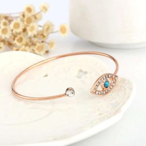 Bracciali Braccialetti con ciondoli Colore oro Forma rotonda Occhi diabolici fortunati Hamsa turco Bracciale aperto a mano con castone Pietra blu Cz Gioielli da donna D