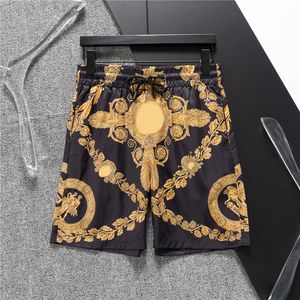 2024 Mäns shorts designer Ny sommarlovssurfing byxor Klassisk blomkedja ansikte tryck utdragande sport fritid strandbyxor asiatisk storlek m-3xl