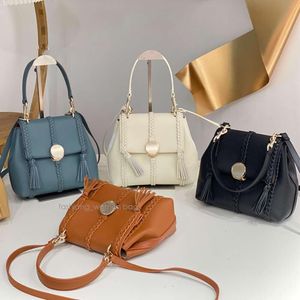 7A 1: 1 Luxury Hangbag Designer Womens Bag Calfskin Axelväskor Kohide Fashion Tote Handväska Tassel äkta läderhandtag Bag Braid Ladies Bag Top Quality