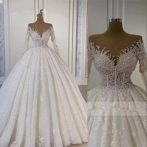 Abiti Bling Abiti da ballo di lusso Abiti da sposa Abiti da sposa Applicazioni in pizzo Collo gioiello Maniche lunghe Illusione Perline di cristallo Lunghezza del pavimento V