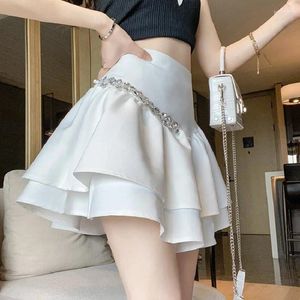 スカート2024韓国の黒い白いラインストーンミニハーフボディスカートハイウエスト女性ファッションエレガントな春のフリル層