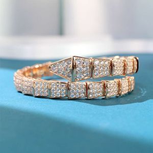 Versione alta v Accessori in oro: Versione ampia con micro intarsio Bracciale da donna a forma di serpente semielastico con zirconi lucidi placcati in oro