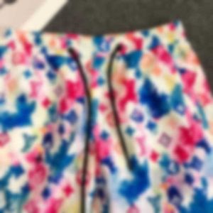 Shorts masculinos designer para moda verão masculina floral e esportivo agasalhos na moda jovem colorido brisa fresca secagem rápida 5/4 shorts 1M5o
