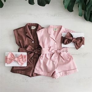 1-6Y Kvinnors ärmlösa Lapel Jumpsuit i fast färg 240116