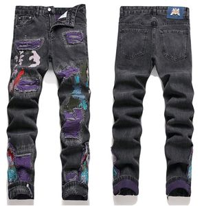 West Coast hip-hop Uomo Jeans denim elasticizzati stampati Streetwear Personaggio Teschio pleins Pantaloni dipinti a fiamma Bottoni vintage Pantaloni slim strappati design originale