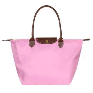 Borse da sera di lusso alla moda Borsa da spiaggia in nylon di design Borse a tracolla casual Borsa per gnocchi impermeabile Tote da donna Borse per mamma Borse per la spesa a mano di grande capacità