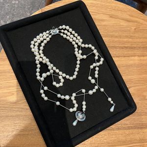 Damen-Designer-Halsketten, gebrochene Perlenkette, hochwertige lange Perle, Stereo-Saturn-Schlüsselbeinkette, unregelmäßige dreischichtige Halskette
