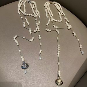 デザイナーネックレス壊れた真珠ネックレス高品質の長い真珠ステレオ土星クラビクルチェーン不規則な3層ネックレス