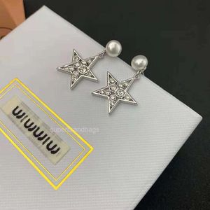 Fashion MIU jewelry new star studded five pointed star pearl earrings Miu's simple temperament s925 silver needle earrings in fashion