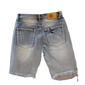 Summer Men Hole Short Short Pants Beggar alla moda raschiato jeans a cinque pezzi Shorts 240189