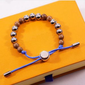 Europa Ameryka Styl mody mężczyźni kobiety Lady Blue Pull-type metalowe kulki Grawerowane V Letter Flower Okrągłe koraliki Bransoletka łańcuchowa