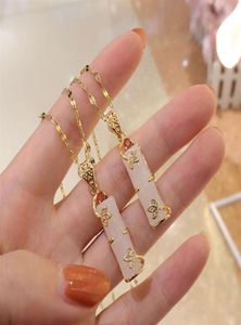 Colar de aço inoxidável banhado a ouro real, joias longas em formato de bambu rosa com pingente de jade natural para mulheres e meninas 282w3754803