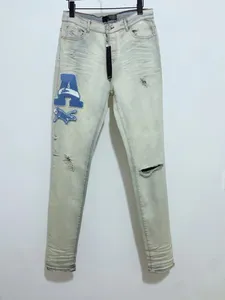 Herr designers jeans casual smala män jean stretch byxor vit a.m broderi förstör täcken rippad rak knä retro byxor hip hop street byxa