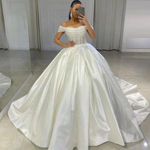 Impressionante grânulo fora do ombro vestido de baile vestidos de casamento lantejoulas cetim princesa vestido de noiva plissado plus size árabe dubai vestidos de casamento para noiva yd