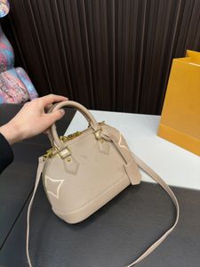 Top Luxury Borse Designer Shell Borse Womens Cross Cowney Denole a spalla Tote Gold Hardware Makeup a colori solidi e borsa 24 cm