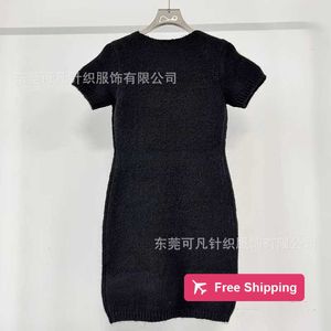 Designer Basic & Casual Dresses Celebrity style V-neck sheep camel hair short sleeved knitted dress with black slim fit and bottom knit skirt, for autumn and winter FUKD