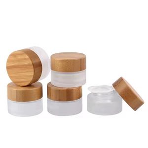 Frascos de vidro fosco vazios por atacado 5g 10g 20g 30g 50g 100g Tampa de bambu natural Garrafa de creme facial Recipiente de cera Garrafa de armazenamento transparente Moonrock Jars Concentrado Dab Jar