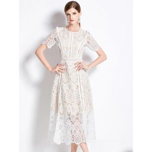 Grundläggande avslappnade klänningar Basic Casual Dresses French Fashion Lace Hollow Out Long Dress Women Summer Short Sleeve Elegant Mid-Längd Hi DHGTF