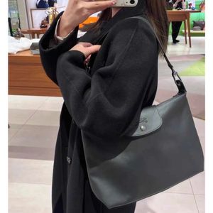 Lyxdesigner handag 2024 Ny Longxiang handväska hobo premium en axel handhållen underarm stor kapacitet tote väska