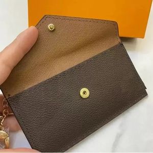 Med Box Womens Men Women Key Pouch Pochette CLES Designer Fashion Handbag Women Mens Credit Card Holder Mini Zippy Coin Purse