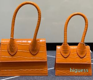 2024 nuova borsa di coccodrillo mini borsa di design borsa a tracolla con tracolla da donna manico superiore mano rossetto cena in pelle di alta qualità hardware dorato fibbia cinturino lungo