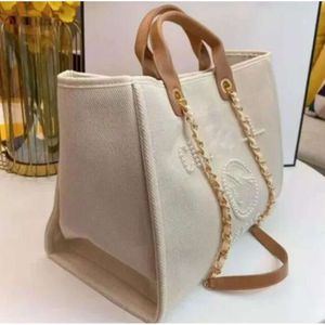 Designer Tote Beach Summer Shopping Bag Canvas Nylon 2023 Boken Totes Women Stora handväskor Läder axelväskor Purse Crossbody Messenge