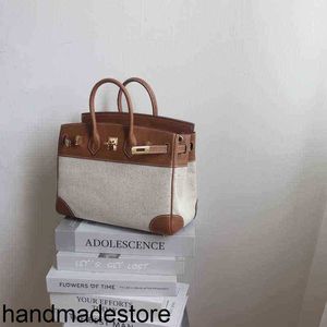 Platinum Handbag Designer Bag Goddess of Temperament Casual with Small Size and Large Capacity. the First Layer of Cowhide Is Equipped with Canvas 25 Handbag