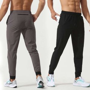 Lu Womens Ll Erkekler Jogger Uzun Pantolon Spor Yoga Kıyafet Hızlı Kuru Drawstring Spor Salonu Cepleri Eşyalar Pantolonlar Erkekler Sıradan Elastik Bel Fitness Taytlar 789