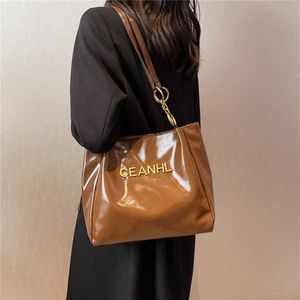 Wzór wysokiego i skórzanego przewożący damską torbę nową minimalistyczną letnią dojeżdżającą do pracy na pojedynczym ramię fabrykę online 70% sprzedaży