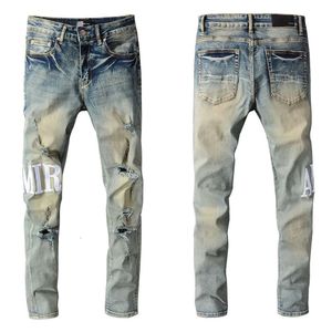 Nya europeiska och amerikanska high street trendiga varumärken retro nödställda jeans med herrogotyp broderad elastisk smal passformbyxor