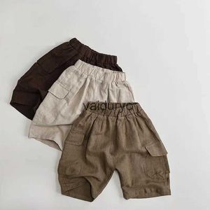 Shorts 2023 sommar ny ldren casual shorts fasta pojkar lösa shorts vintage flickor fick shorts mode barn baby kläder h240508