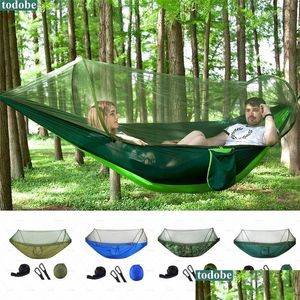 Hammocks 12 Person Outdoor Cam Hammock High Strength Parachute Fabric Hanging Bed Travel Hunting Slee Swing With Mosquito Net 220606 D Dhh0H