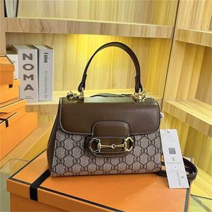 Bolsa com fivela em ferradura nova moda versátil sela nicho de um ombro bolsa crossbody 1289