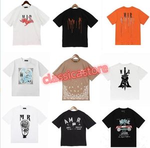 Menswomens tasarımcısı grafiti tişörtler baskılı moda adam tişört pamuklu gündelik tees kısa kollu lüks hip hop sokak kıyafeti amirlik erkek gömlek beyaz turuncu e2