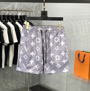 Mężczyźni projektant mody wodoodporny tkanina Summer Men Shorts Marka odzieży nylonowe spodnie plażowe spodnie pływackie