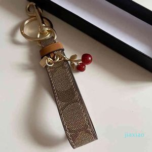 Chaveiro de luxo adorável minúsculo bonito cereja chaveiro para mulheres charme saco titular ornamento pingente acessórios correntes