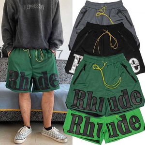 Abbigliamento firmato Pelle Rhude Lettere ricamate Mesh Pantaloncini da basket traspiranti High Street Capris con coulisse Coppie alla moda Joggers Abbigliamento sportivo OAXX